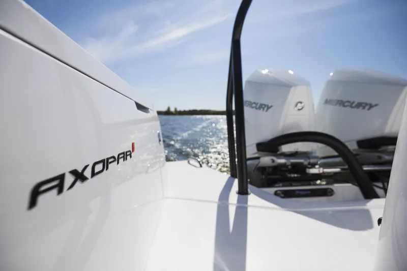 Slide: The Image of 2025 Axopar 37 XC CROSS CABIN with Mercury engines on a sunny day. - 17