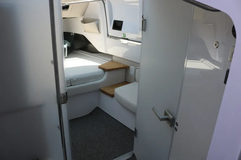 Slide: The Image of Interior cabin of 2025 Axopar 37 XC Cross Cabin, featuring modern design and compact layout. - 23