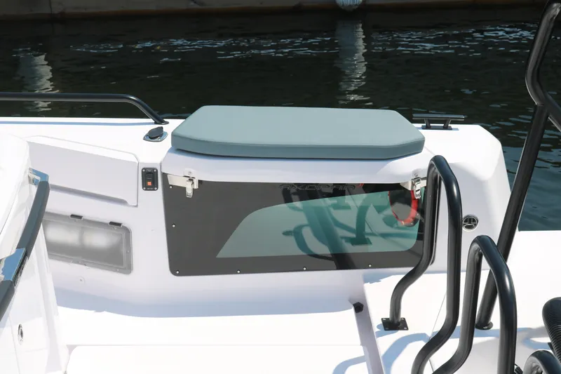 Slide: The Image of 2025 Axopar 37 XC Cross Cabin boat deck with seating and railing. - 7