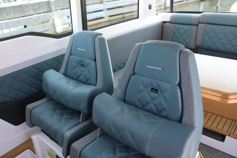 Slide: The Image of Luxurious interior of 2025 Axopar 37 XC Cross Cabin with stylish seating and modern design. - 12