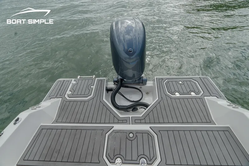 Slide: The Image of 2024 Starcraft SVX 210 OB DC boat with outboard motor on water. - 11