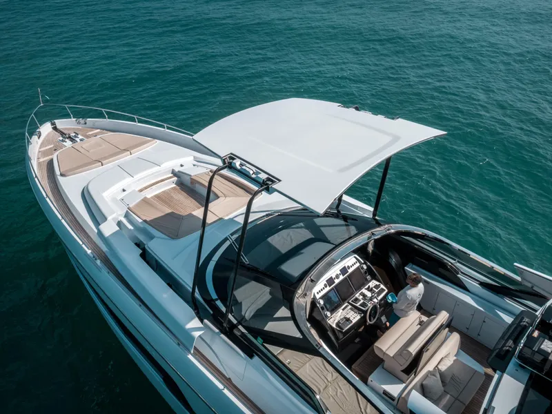 Slide: The Image of Luxury 2016 Riva 88' Florida yacht cruising on open sea. - 31