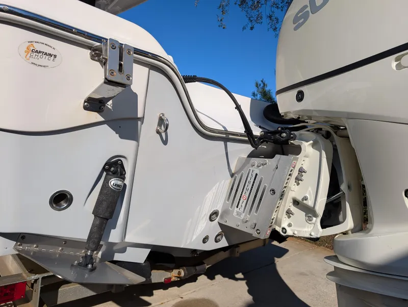 Slide: The Image of 2020 Blue Wave 2800 Makaira boat with Suzuki outboard motor, close-up view. - 11