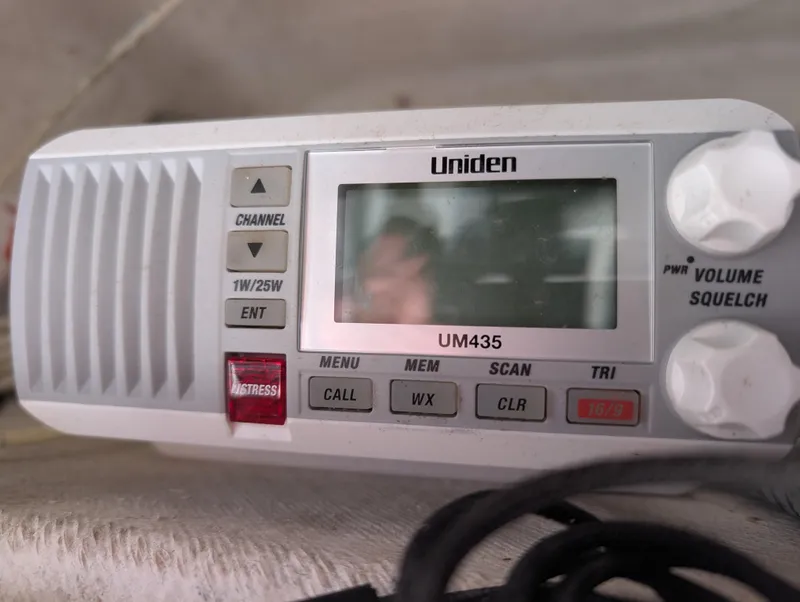 Slide: The Image of Uniden UM435 marine radio on 2020 Blue Wave 2800 Makaira boat dashboard. - 22