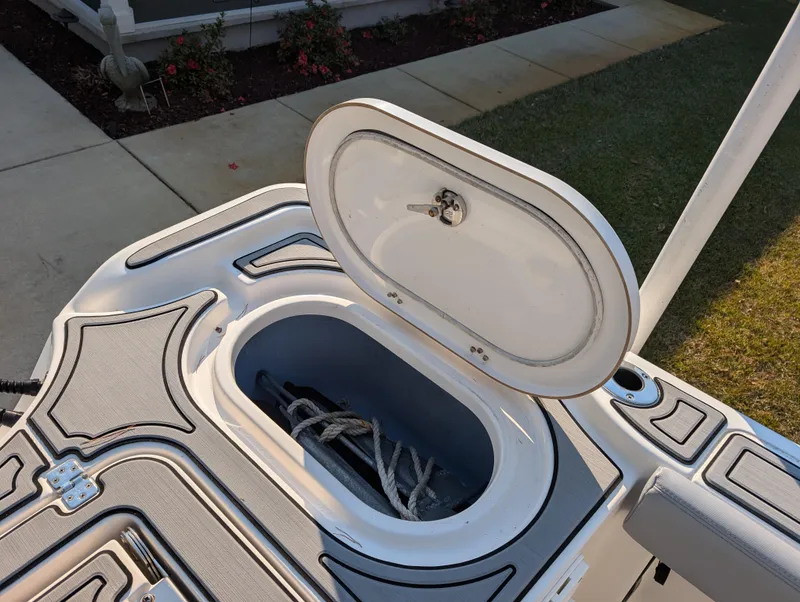 Slide: The Image of Open storage compartment on 2020 Blue Wave 2800 Makaira boat deck. - 33