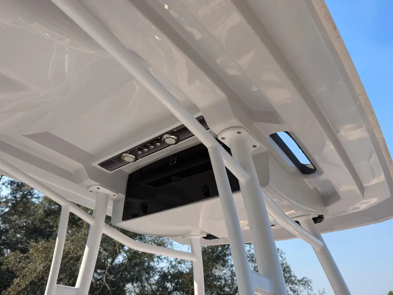 Slide: The Image of 2020 Blue Wave 2800 Makaira boat T-top with integrated lighting and sturdy support structure. - 37