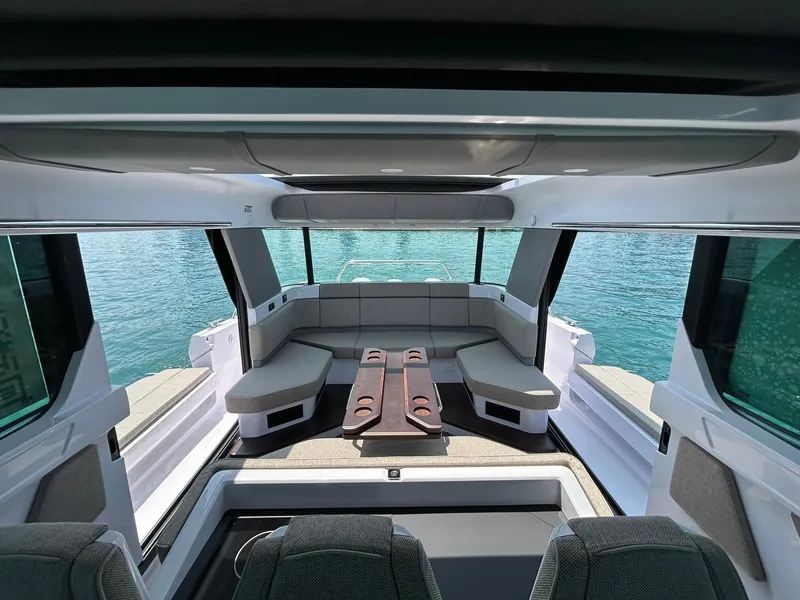 Slide: The Image of Interior of 2025 Axopar 45 XC Cross Cabin, featuring spacious seating and modern design. - 19