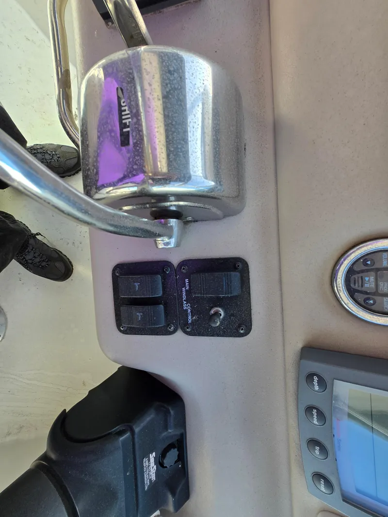 Slide: The Image of Close-up of 2000 Sea Ray 310 Sundancer boat controls and dashboard instruments. - 19