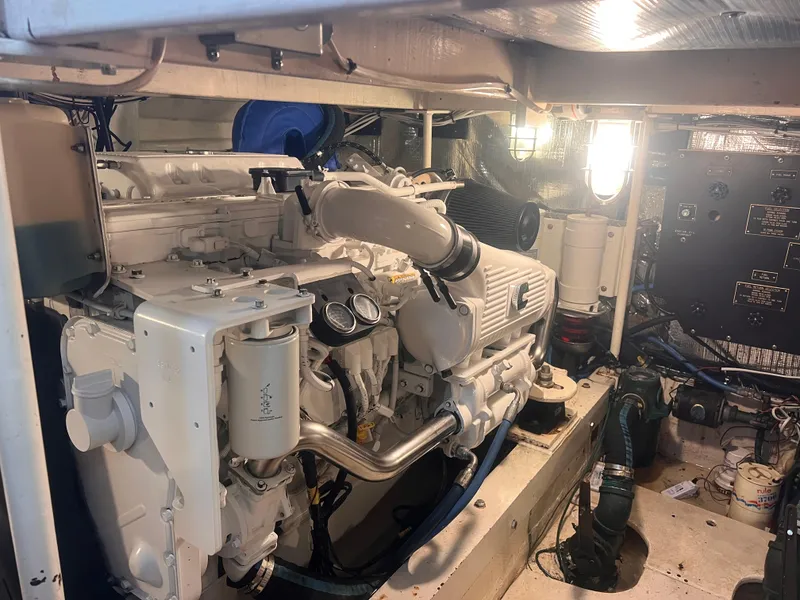 Slide: The Image of Engine room of a 1979 Pacifica 44 Flybridge boat, showcasing a well-maintained engine. - 6