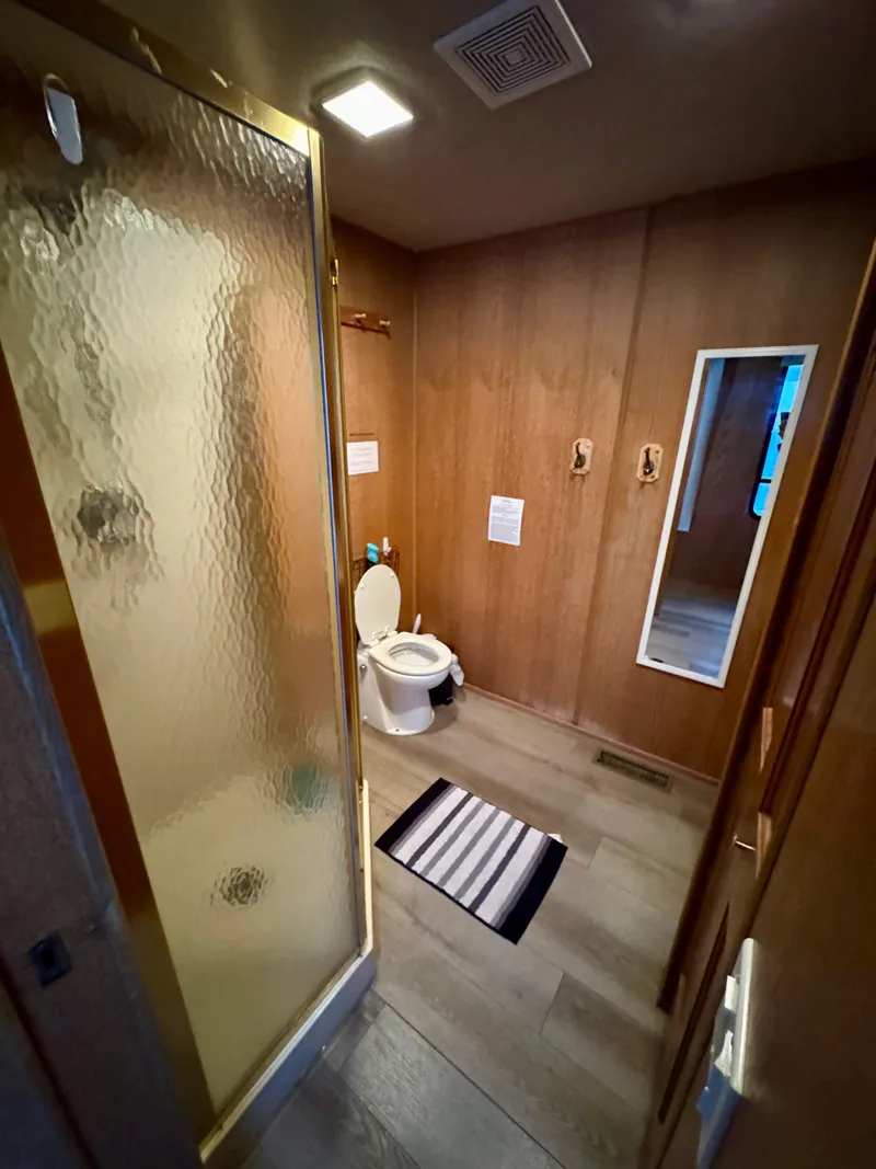 Slide: The Image of Bathroom interior of 1997 Sumerset Johnny Quest Trip #33 with shower and toilet. - 13