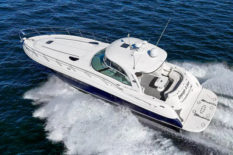 Slide: The Image of 2005 Sea Ray 500 Sundancer yacht cruising on open water, aerial view. - 18