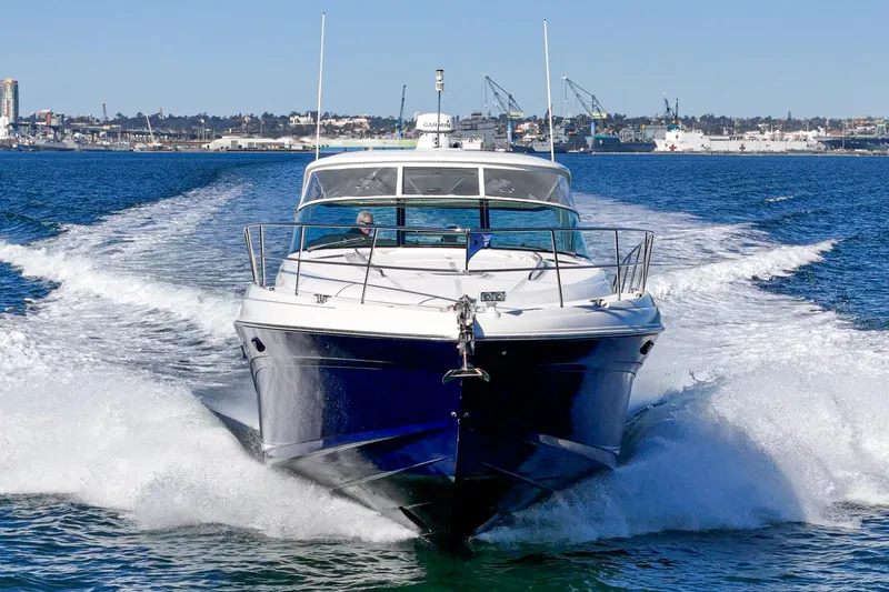 Slide: The Image of 2005 Sea Ray 500 Sundancer yacht cruising on open water. - 26