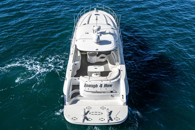 Slide: The Image of 2005 Sea Ray 500 Sundancer yacht cruising on open water, aerial view. - 30