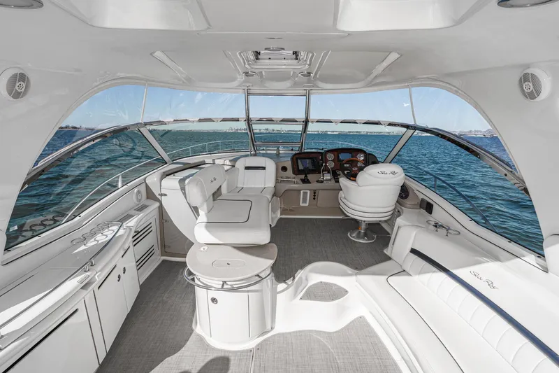 Slide: The Image of Luxurious 2005 Sea Ray 500 Sundancer yacht interior with elegant seating and ocean view. - 43