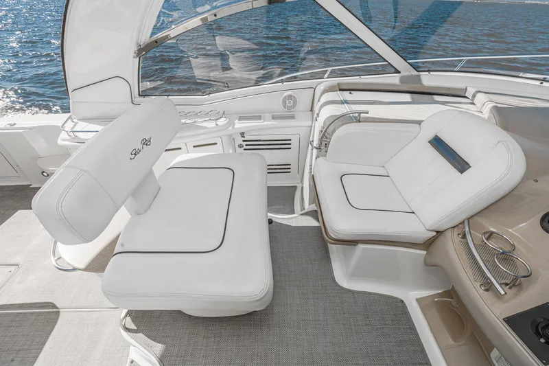 Slide: The Image of Luxurious seating area on a 2005 Sea Ray 500 Sundancer yacht, overlooking the ocean. - 46