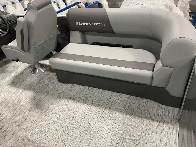 Slide: The Image of 2025 Bennington 20 S STERN RADIUS boat interior with gray seating and modern design. - 10