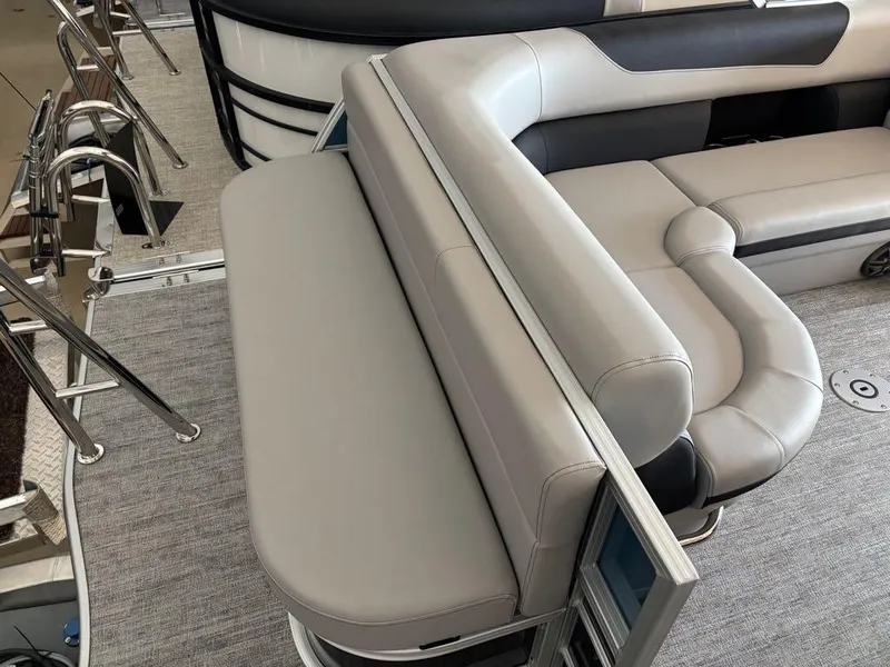 Slide: The Image of 2024 South Bay 200 Series S222CR2 pontoon boat with luxurious seating and modern design. - 4
