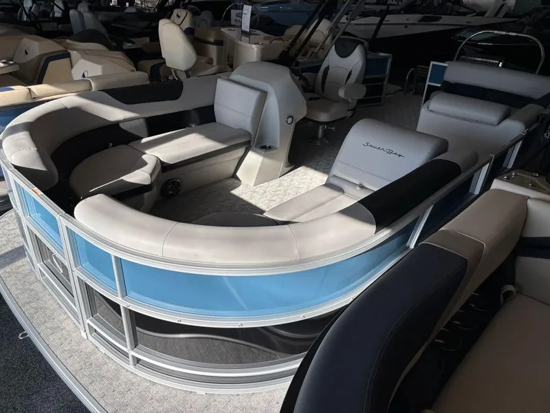 Slide: The Image of 2024 South Bay 200 Series S222CR2 pontoon boat interior with plush seating and modern design. - 6