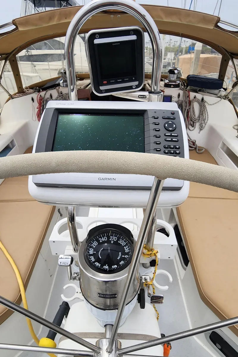 Slide: The Image of Cockpit of 1995 Catalina 42 MkII sailboat with navigation equipment and compass. - 12