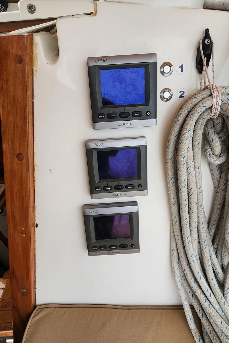 Slide: The Image of Sailing instruments on a 1995 Catalina 42 MkII yacht with coiled rope. - 14