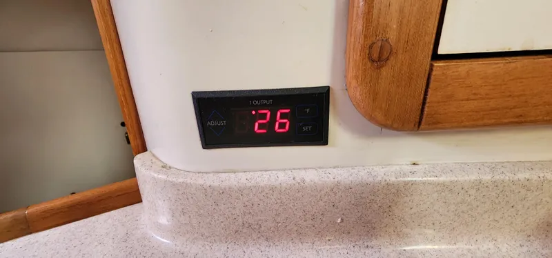 Slide: The Image of Digital display showing "26" on a 1995 Catalina 42 MkII yacht interior. - 30