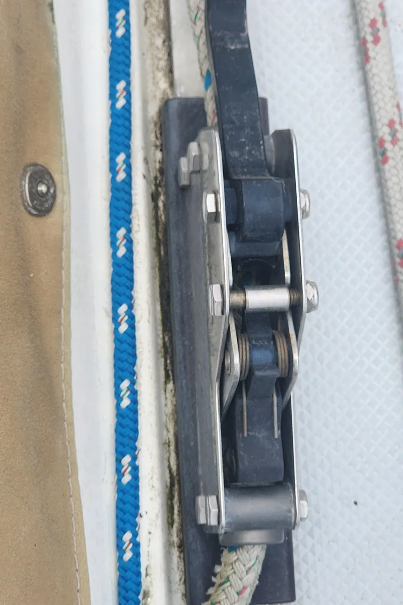 Slide: The Image of Close-up of a Catalina 42 MkII 1995 sailboat pulley system with ropes. - 48