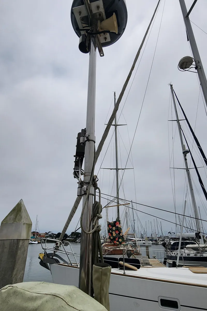Slide: The Image of Sailboats docked at marina, featuring a 1995 Catalina 42 MkII. - 9