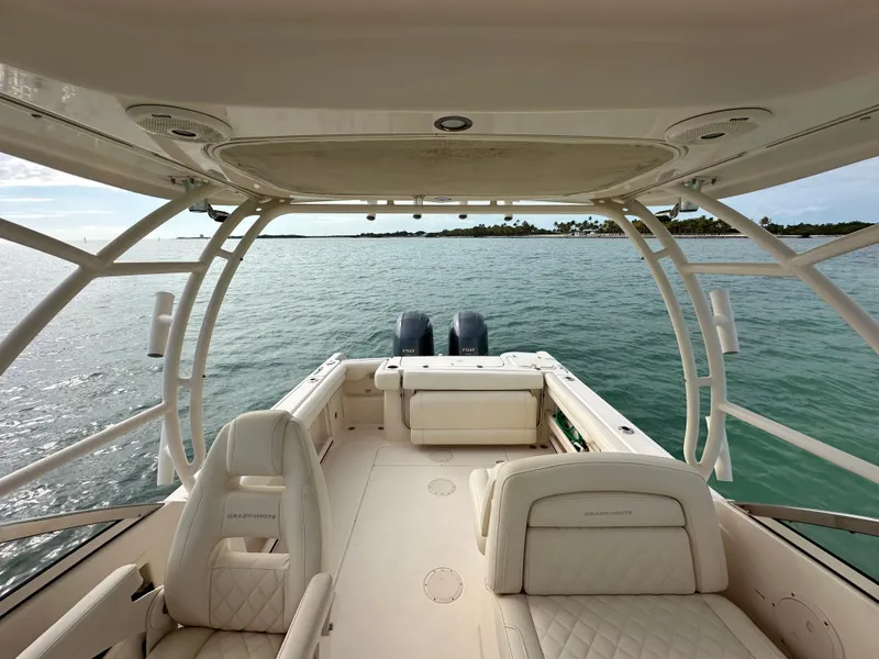 Slide: The Image of 2018 Grady-White Freedom 275 boat interior with ocean view. - 12