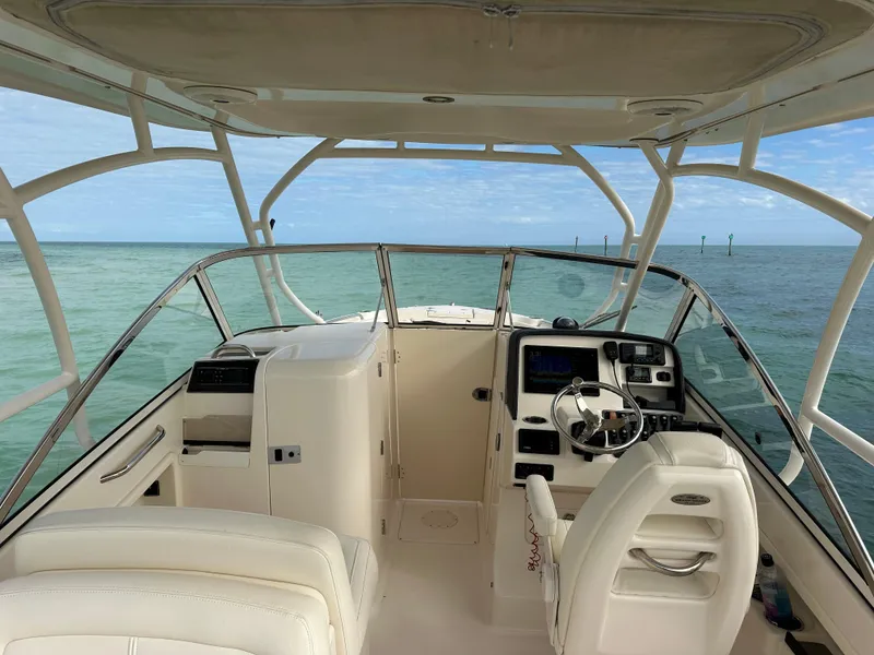 Slide: The Image of 2018 Grady-White Freedom 275 boat interior with ocean view. - 30