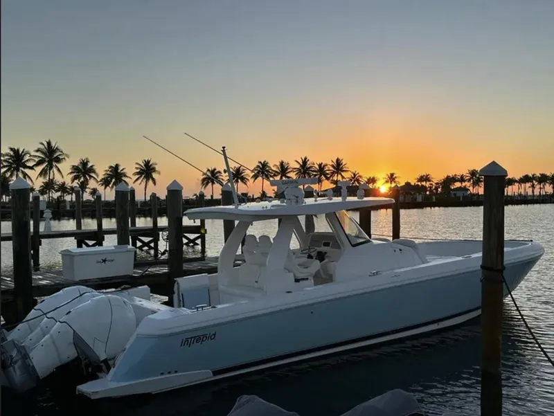 Slide: The Image of Intrepid 407 Nomad SE 2022 docked at sunset. - 3