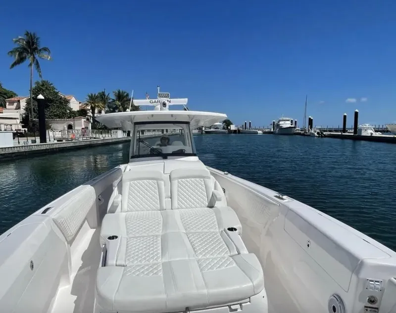 Slide: The Image of Intrepid 407 Nomad SE 2022 in a sunny marina. - 9