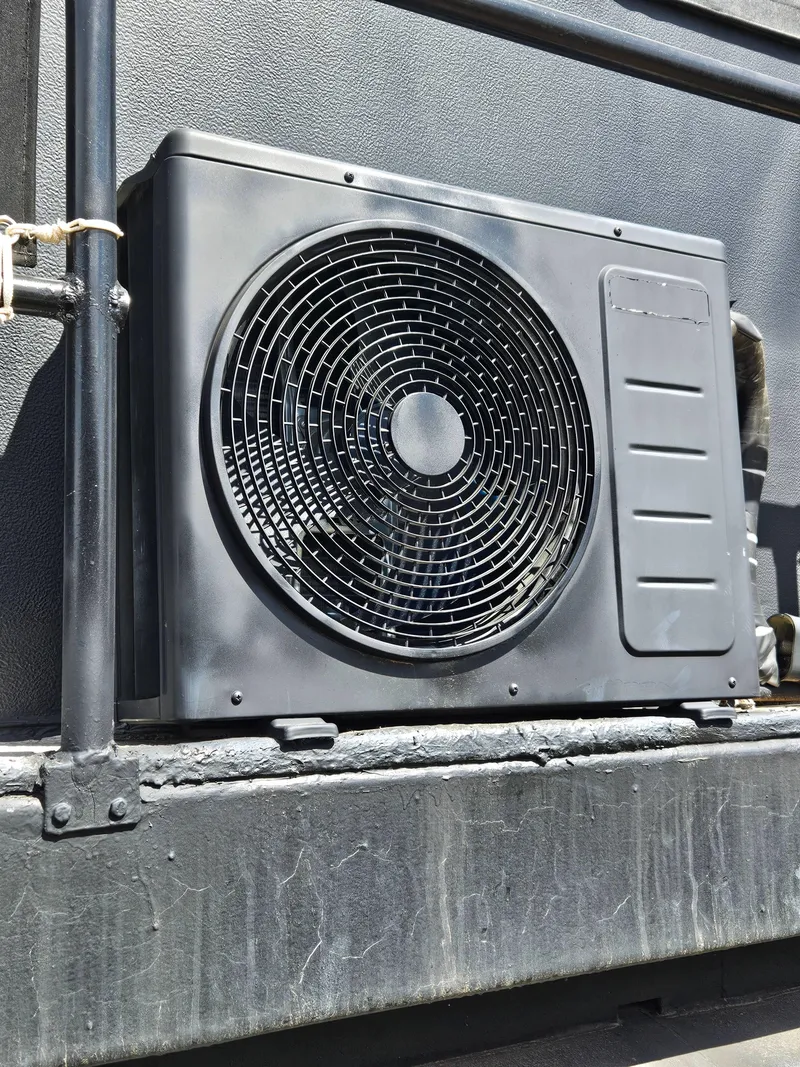 Slide: The Image of Air conditioning unit on a 1990 Skipperliner houseboat exterior. - 10
