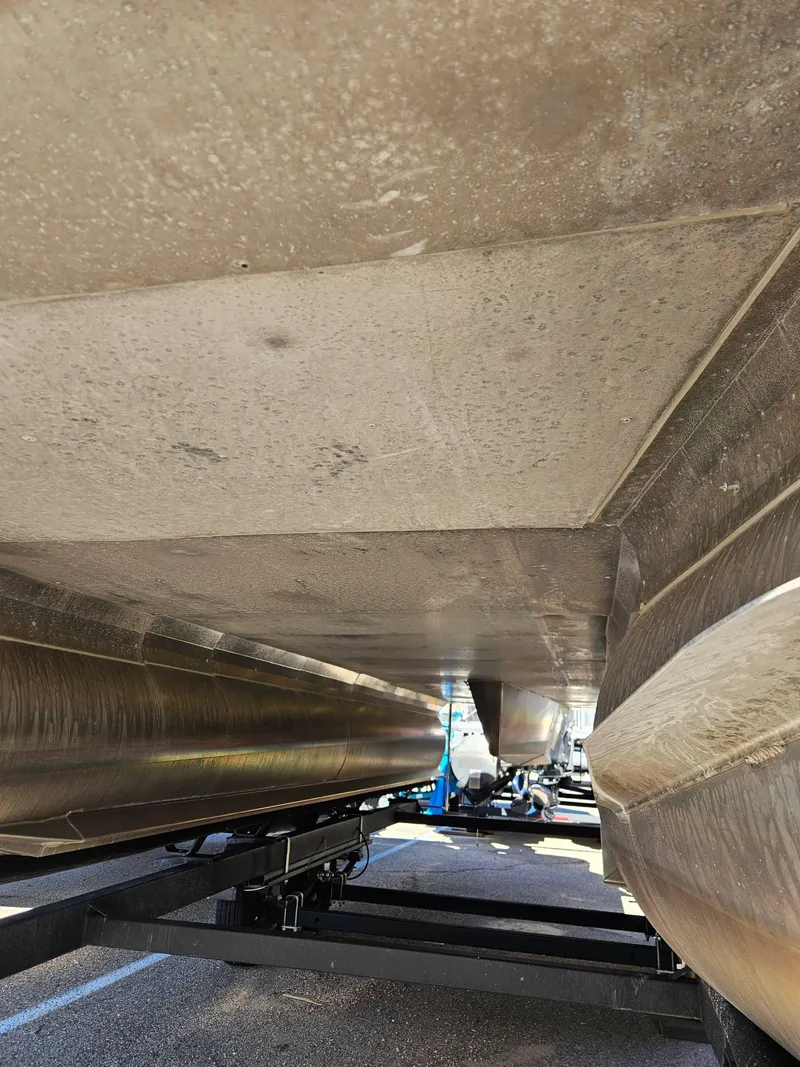Slide: The Image of 2019 Barletta L21Q Pontoon underside view on trailer. - 11