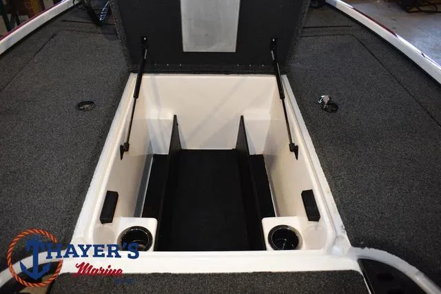 Slide: The Image of 2019 Nitro Z18 boat storage compartment with Thayer's Marine logo. - 13