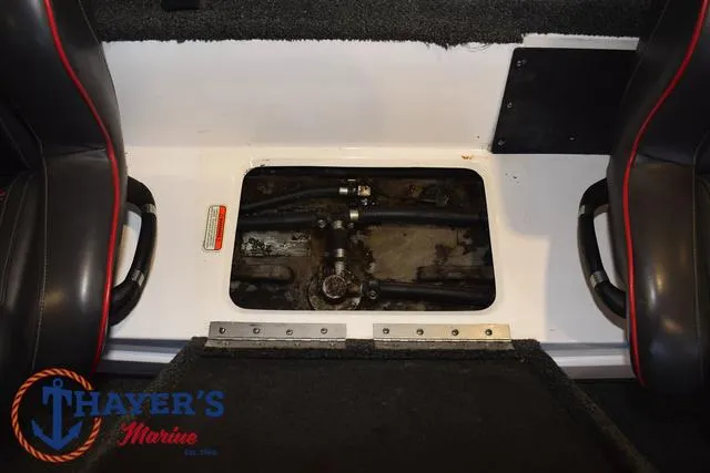 Slide: The Image of Interior view of a 2019 Nitro Z18 boat showing under-seat storage compartment. - 18