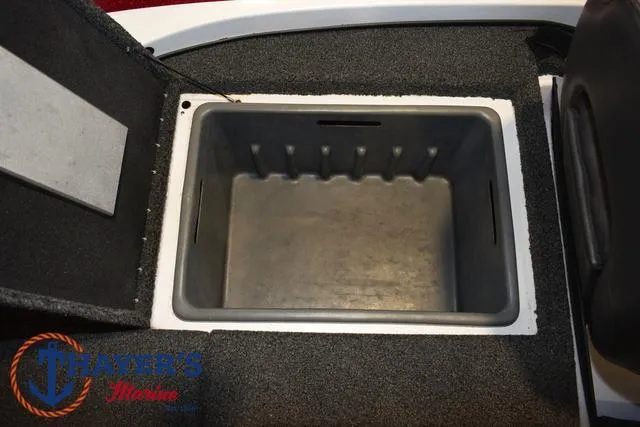 Slide: The Image of Open storage compartment in a 2019 Nitro Z18 boat. - 27
