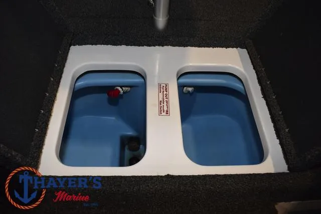 Slide: The Image of 2019 Nitro Z18 boat livewell compartments with Thayer's Marine logo. - 28