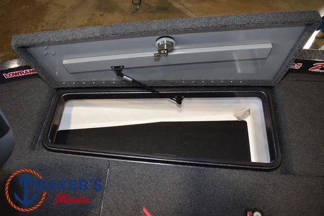 Slide: The Image of Open storage compartment in 2022 Caymas CX 21 boat. - 17
