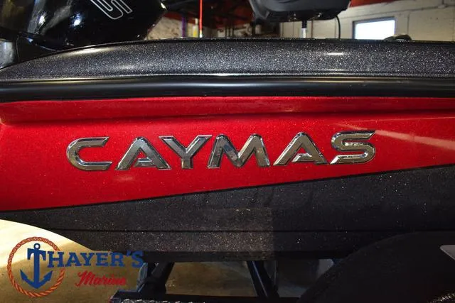Slide: The Image of 2022 Caymas CX 21 boat with red and black finish, Thayer's Marine logo visible. - 9