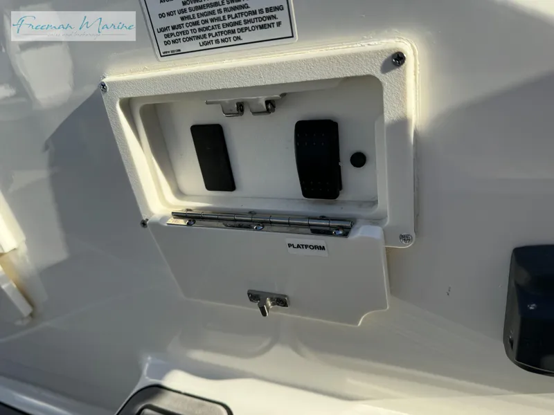 Slide: The Image of 2020 Sea Ray SLX 280 boat platform control panel with warning label. - 15