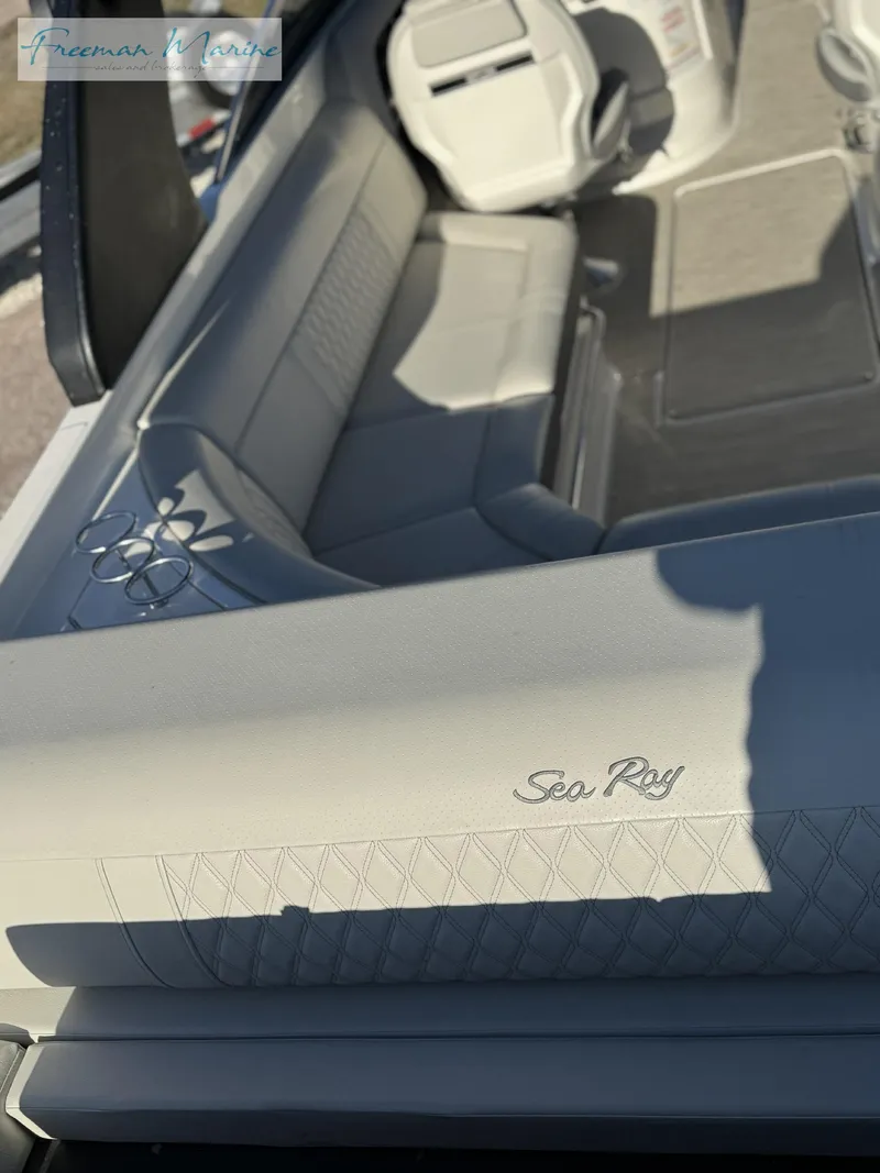 Slide: The Image of 2020 Sea Ray SLX 280 interior with luxurious seating and elegant design. - 19