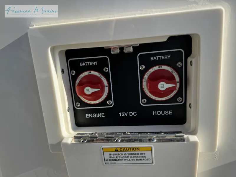 Slide: The Image of Battery switches on a 2020 Sea Ray SLX 280 boat, labeled for engine and house. - 27