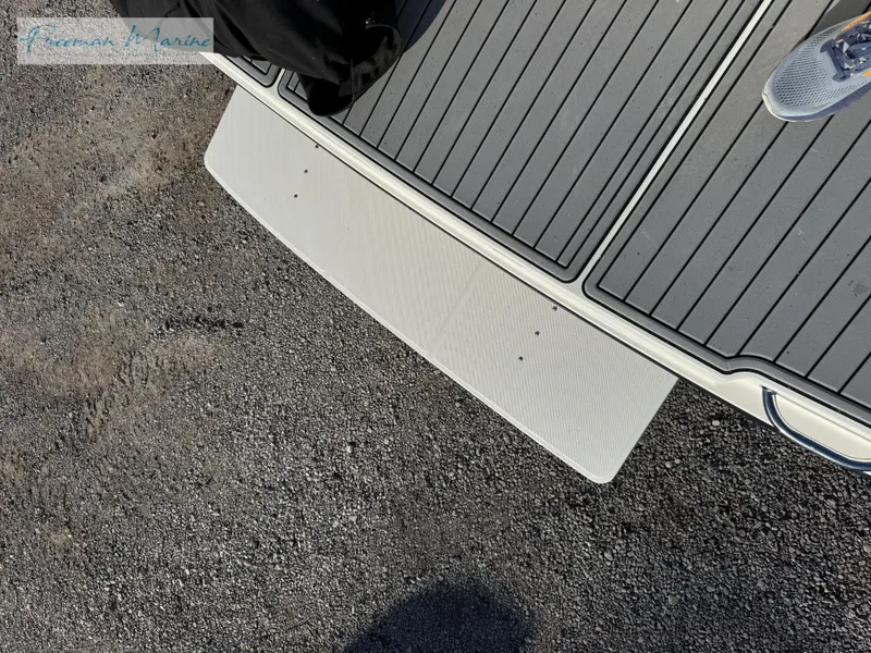 Slide: The Image of 2020 Sea Ray SLX 280 boat deck with textured flooring. - 28