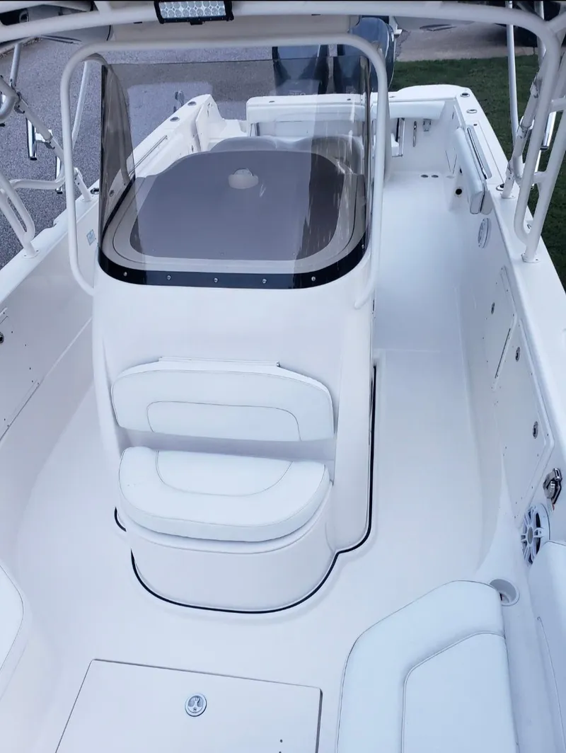 Slide: The Image of 2006 Wellcraft 352 Sport boat interior with seating and console. - 3