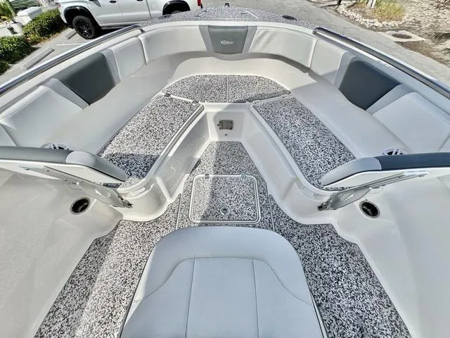 Slide: The Image of 2023 Robalo R230 boat interior with spacious seating and modern design. - 16