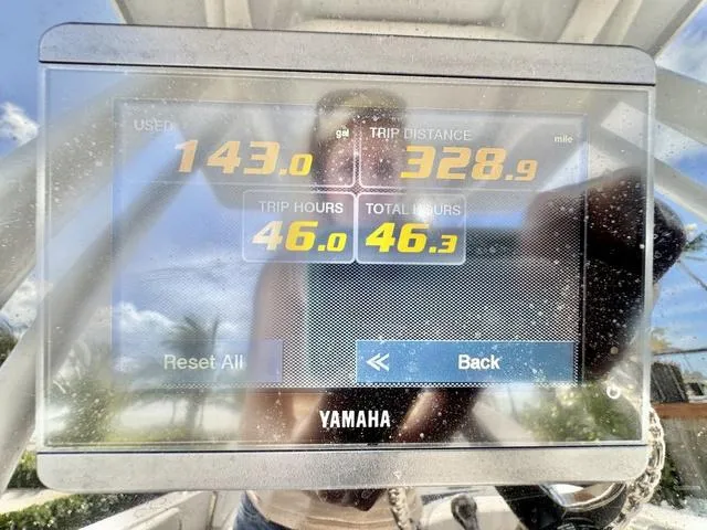 Slide: The Image of Yamaha display showing trip data on 2023 Robalo R230 boat. - 22