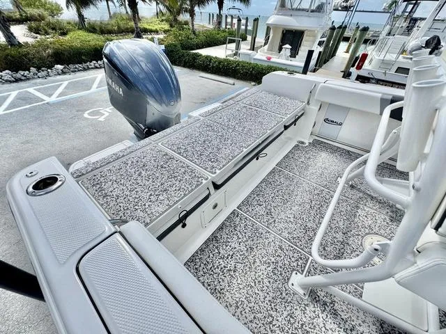 Slide: The Image of 2023 Robalo R230 boat interior with Yamaha engine, featuring spacious seating and modern design. - 5
