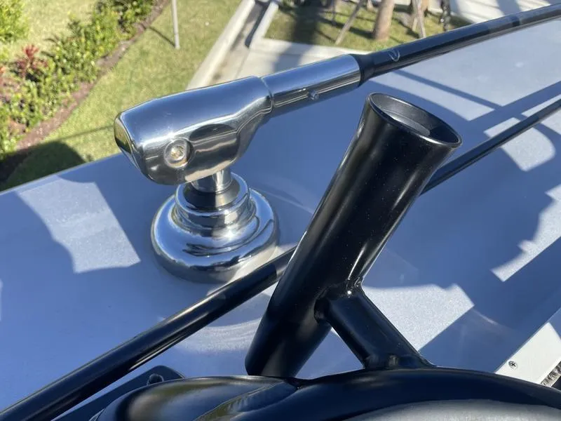 Slide: The Image of Close-up of a 2020 Stuart 27 CC boat's fishing rod holder and mount. - 11