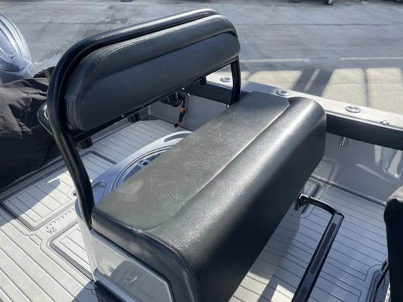 Slide: The Image of 2020 Stuart 27 CC boat seat with black upholstery and sturdy frame. - 25