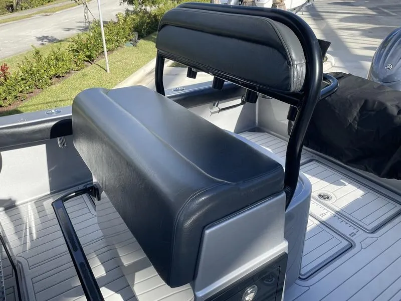 Slide: The Image of 2020 Stuart 27 CC boat seat with black leather upholstery and sturdy frame. - 26